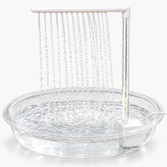 Clear shallow basin with a white pump and a horizontal spray bar releasing many fine streams of water, shown on a plain white background. 1