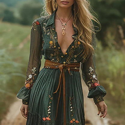Close view of the deep V neckline, buttons, embroidered bodice and sheer embroidered sleeves with gathered cuffs 3