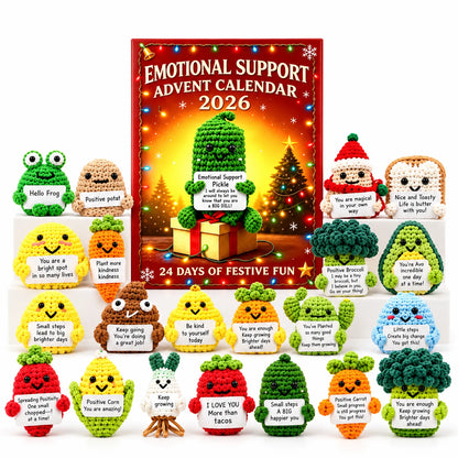 Red advent calendar box surrounded by all the crocheted fruit, vegetable and festive characters holding little message cards 2