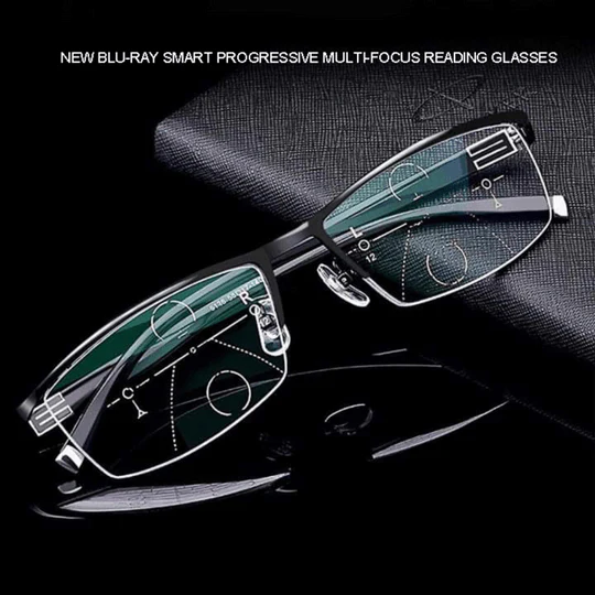 Black half-rim progressive glasses resting on a dark textured surface, with lens zone markings visible 1