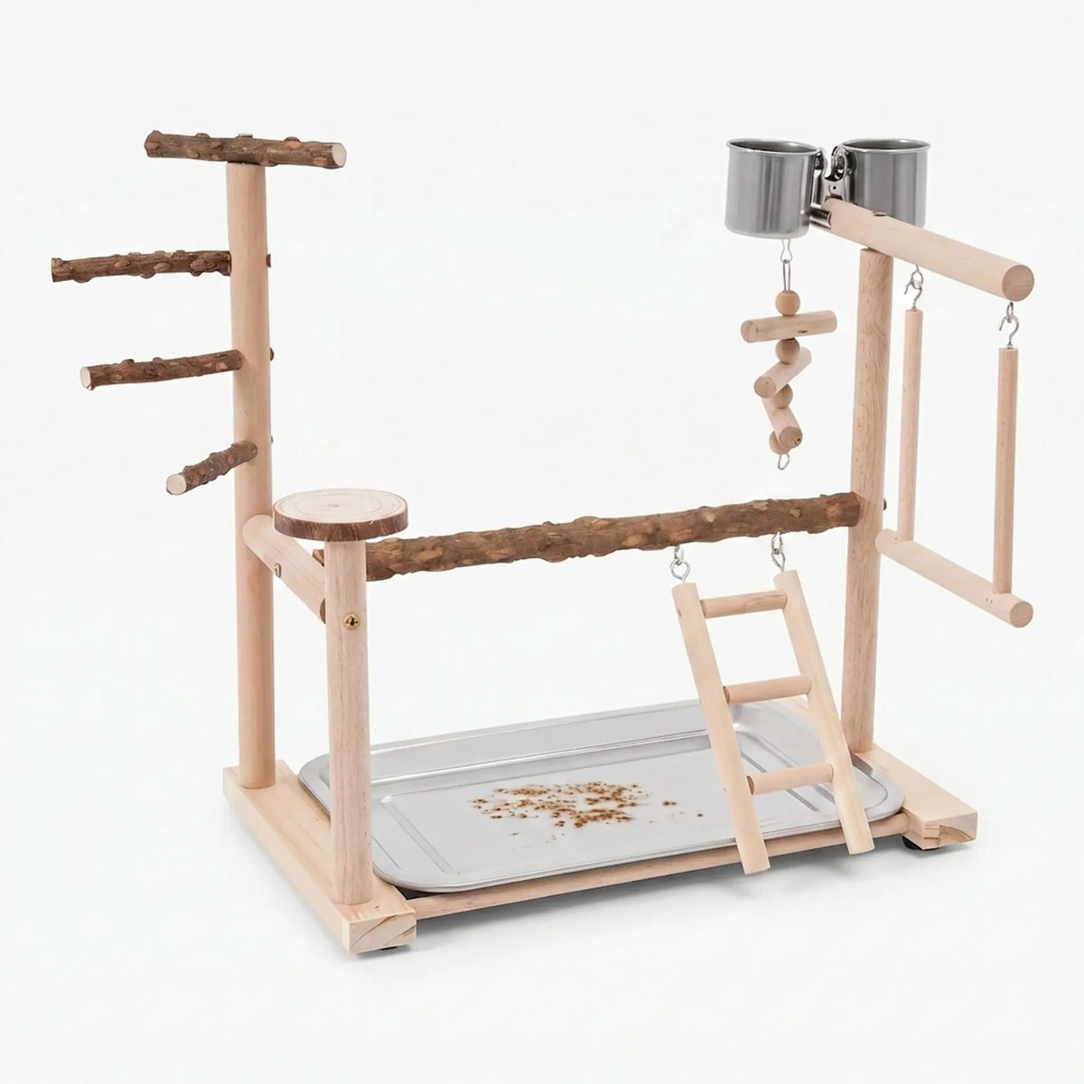 Wooden bird playground on a plain white background, with natural branch perches, a ladder, swings, hanging toy, two steel cups and a seed tray. 1