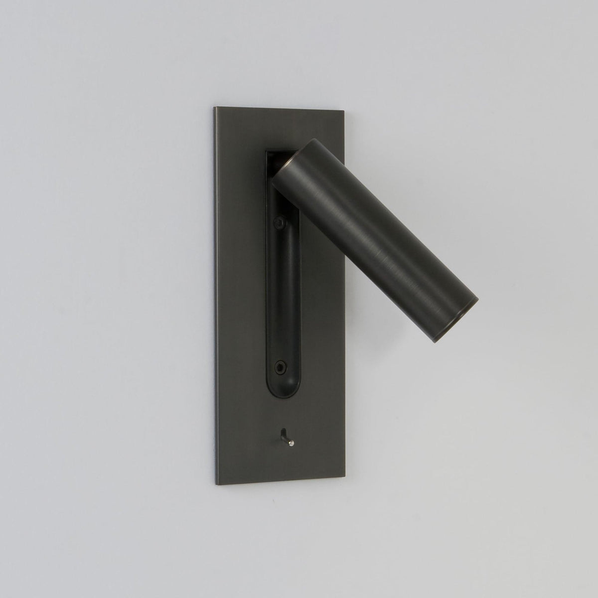 Dark wall light on a light wall with the unlit tube angled out to the right 6
