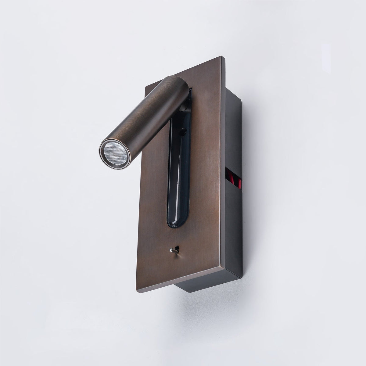 Bronze wall light seen from the side, showing the deep rear housing and red wiring 24