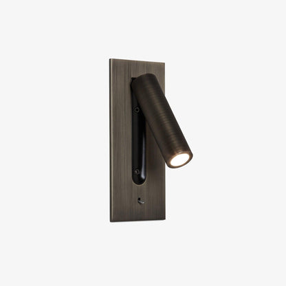 Bronze wall light with the lit tube swung out to the right, black recess behind it 3