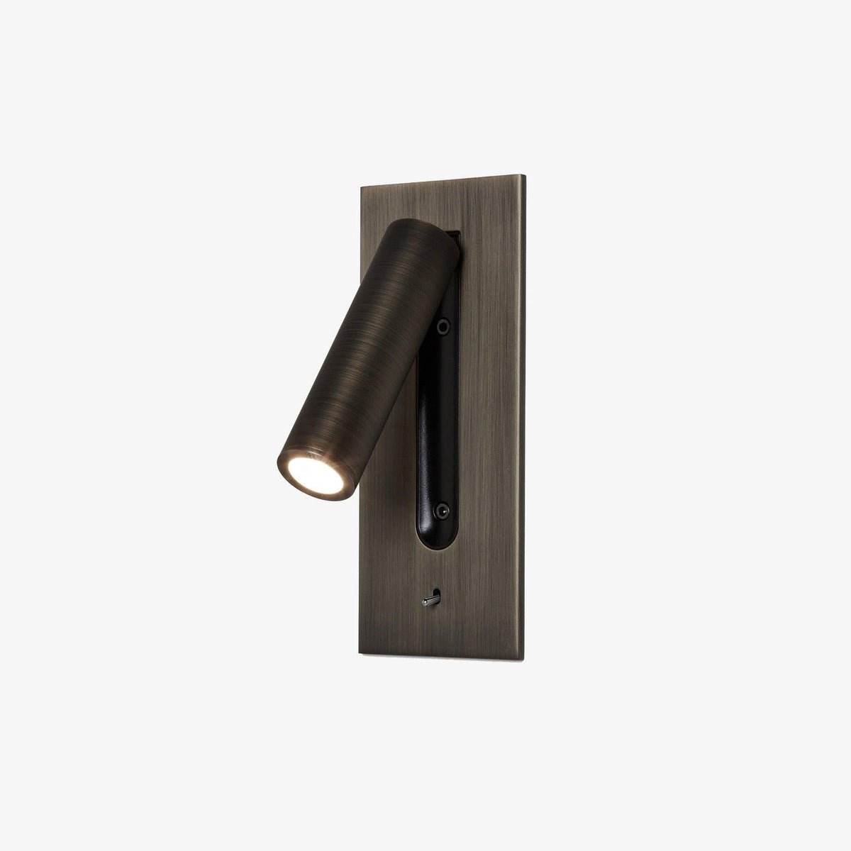 Bronze-finish recessed wall light with rectangular plate, lit swivel tube angled left and toggle switch below 1