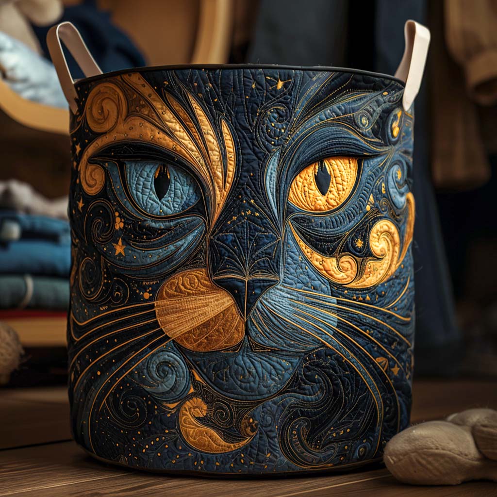 Close-up of the quilted round basket with cream fabric handles, showing the stylised blue and gold cat face, standing on a wooden floor. 1