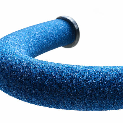 Close-up of the blue gritty perch surface, showing the coarse granular texture and the dark end fitting. 4