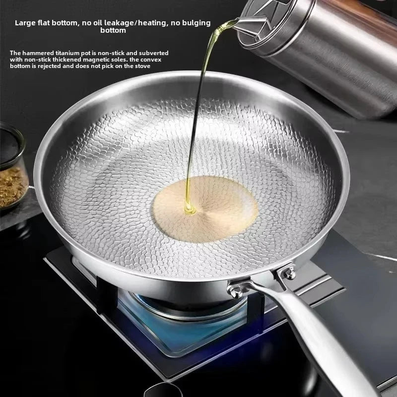 Oil being poured into the pan on a gas hob, showing the textured surface and flat base. 7