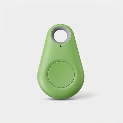 Green teardrop-shaped tracker with a round central button and keyring hole, on a plain background 7