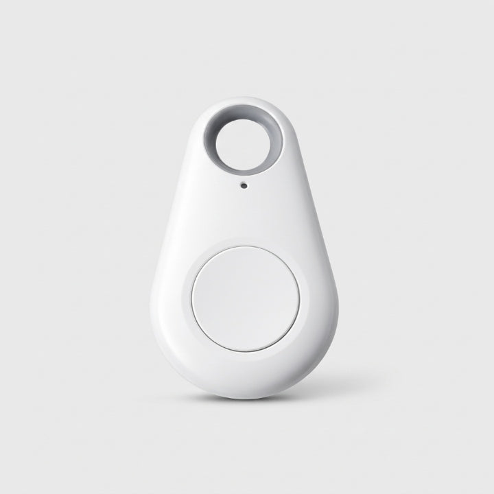 White teardrop-shaped tracker with a round central button and keyring hole, on a plain background 6