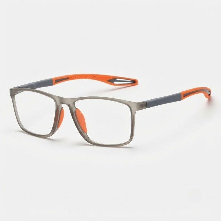 Angled view of translucent grey frames with orange silicone arm tips and orange nose pads on a plain white background. 5