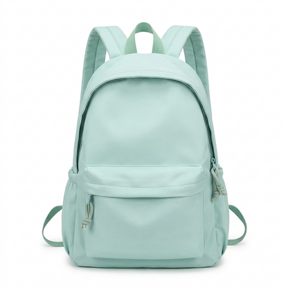 Front view of the mint green backpack with padded shoulder straps, top handle, large zipped compartment and zipped front pocket. 1