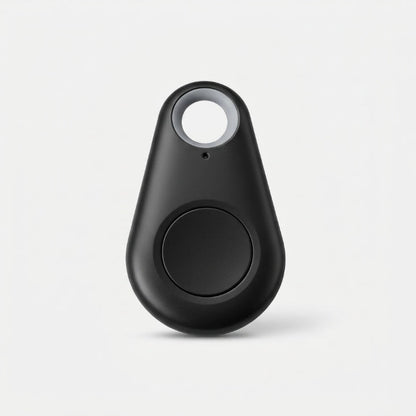 Black teardrop-shaped tracker with a round central button and keyring hole, on a plain background 5