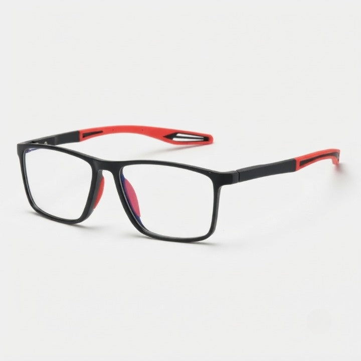 Angled view of square black frames with red silicone arm tips and red nose pads against a plain white background. 1