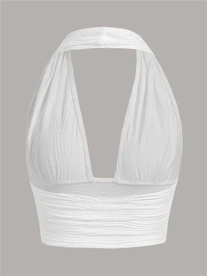 Low-cut halter-neck top with open back – Liora