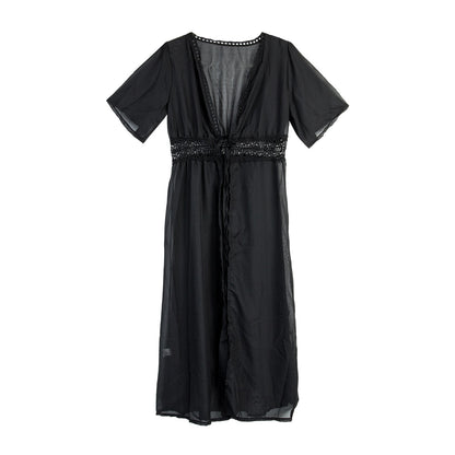 Long beach dress with lace accents and bow fastening – Elara
