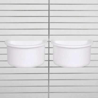Two white half-round plastic bowls hung side by side on the wire bars of a metal cage. 5