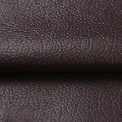 Close-up of the textured dark brown patch material, folded across the middle 9