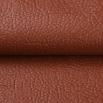 Close-up of the textured tan-brown patch material, folded across the middle 12