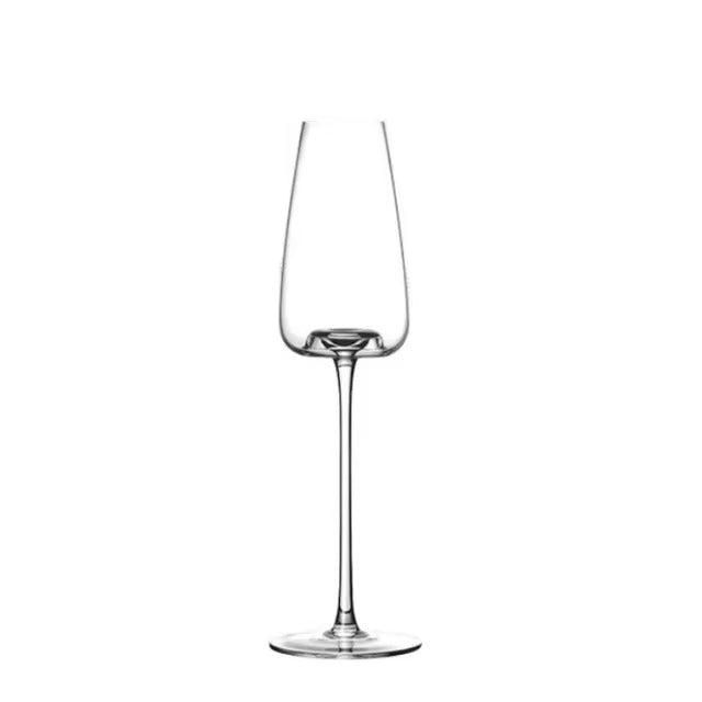 Single empty tall champagne flute with a thin stem and round foot on a white background 12