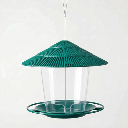 Green feeder shown empty, with ridged roof, clear seed container and round perch tray on a plain background. 6