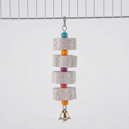 Four pumice blocks alternating with turquoise, orange, purple, red and orange beads, ending in a brass bell, hung from a cage wire. 8
