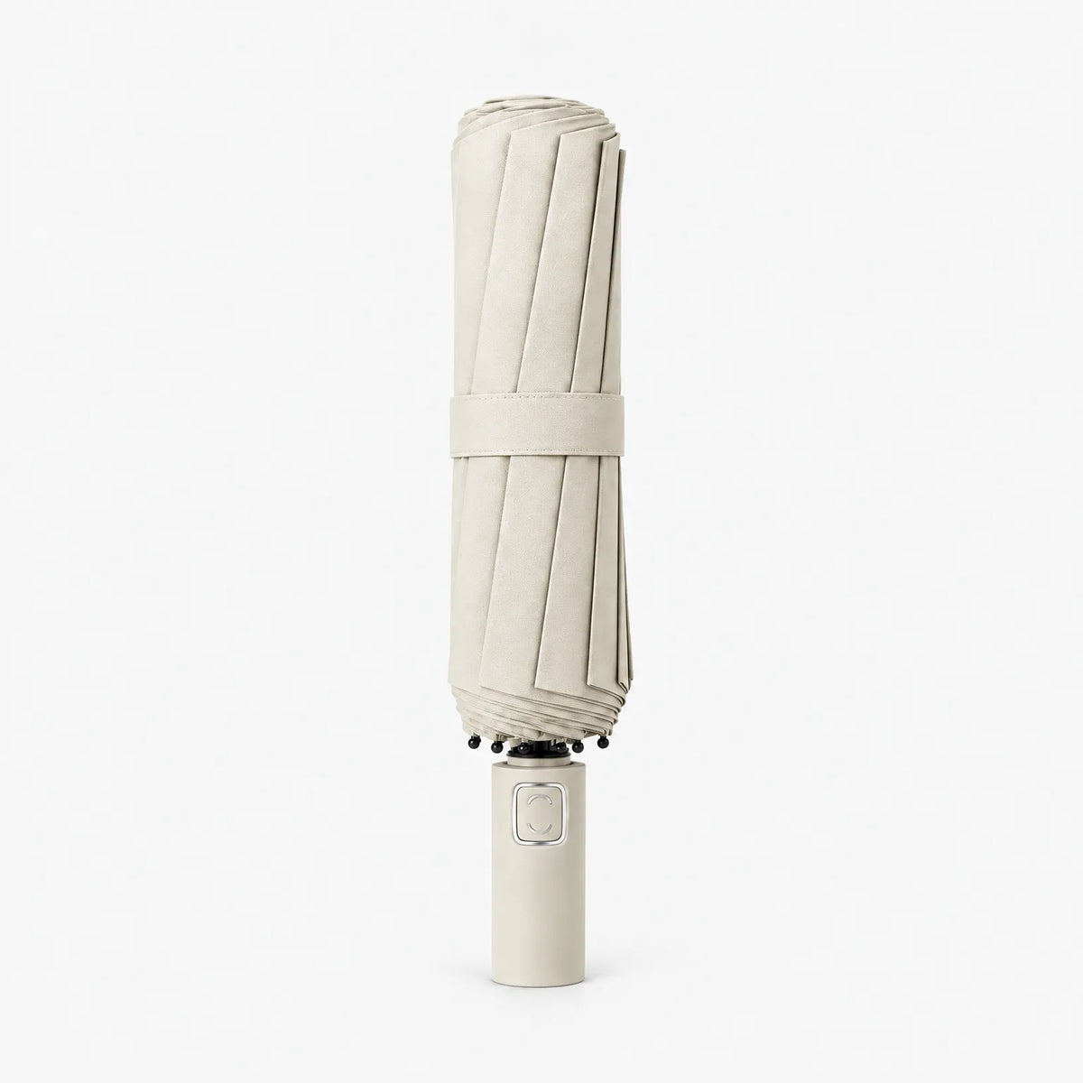 Folded cream umbrella standing handle-down on a white background, with a fabric strap around the pleated canopy. 10