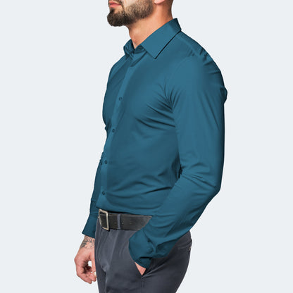 Side view of a teal blue shirt worn with grey trousers and a black belt 11