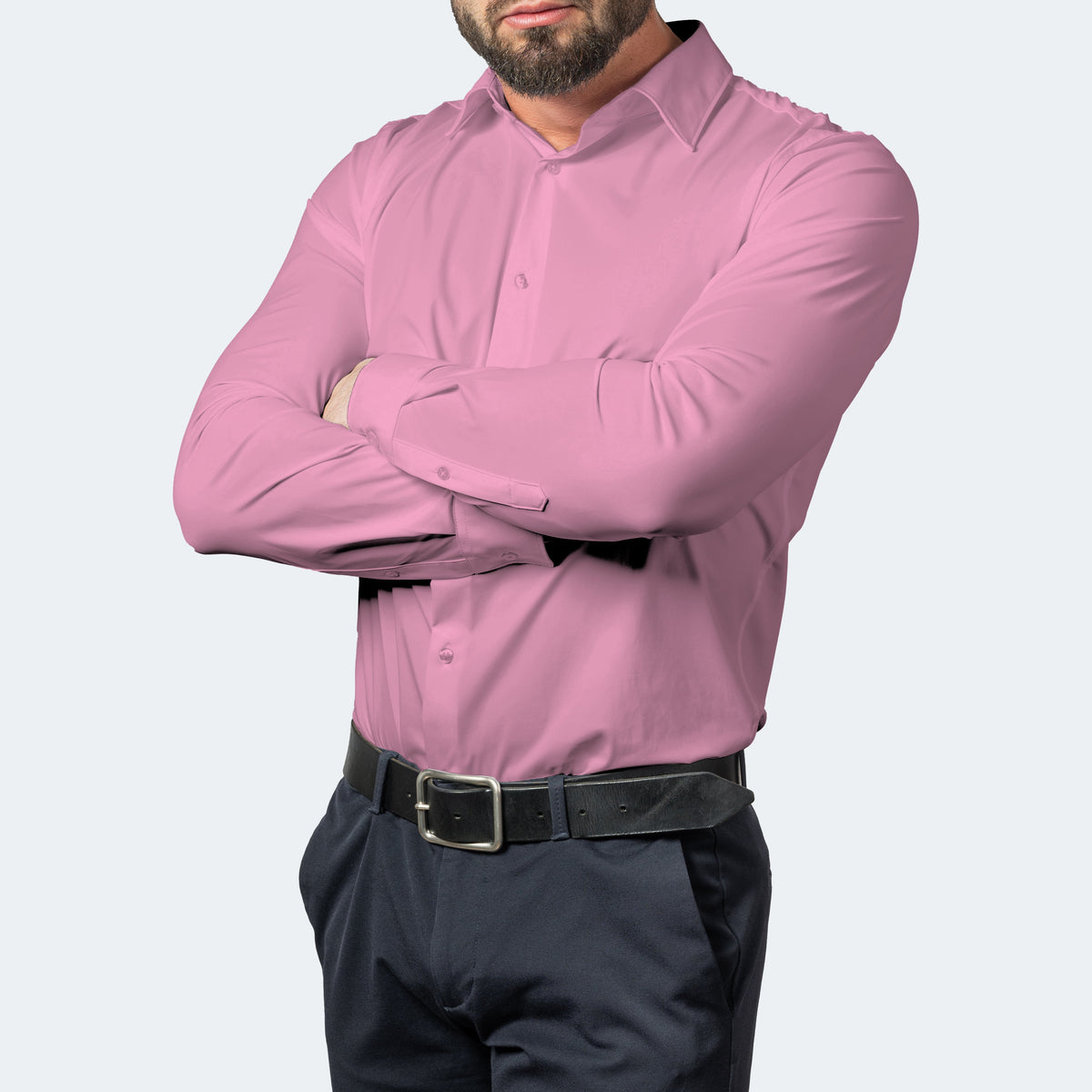 Pink shirt worn by a model with arms folded, showing the cuffs and buttoned front 8