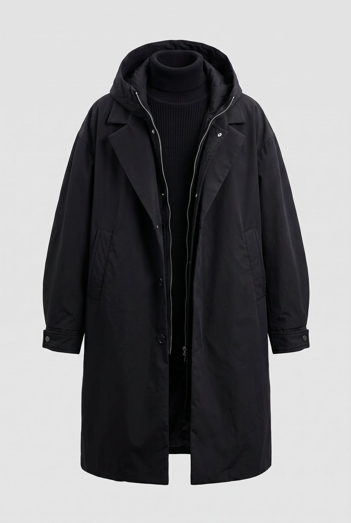 Black hooded raincoat displayed flat on a plain background, open to show the zip and storm flap 8