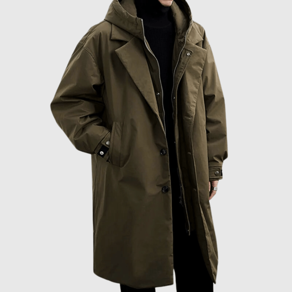 Cropped front view of an olive green hooded raincoat worn open over a black polo neck 1