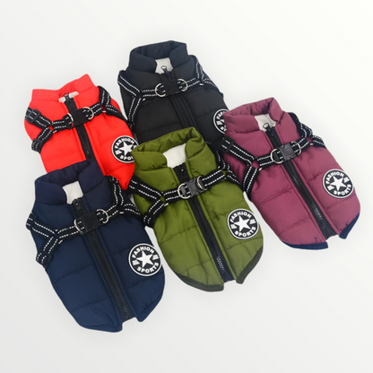 Flat lay of five quilted jackets in red, black, burgundy, navy and green, each with zip, reflective harness straps and a round patch. 4