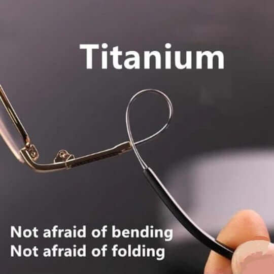 Hand bending a thin arm of the glasses into a loop to show its flexibility 7