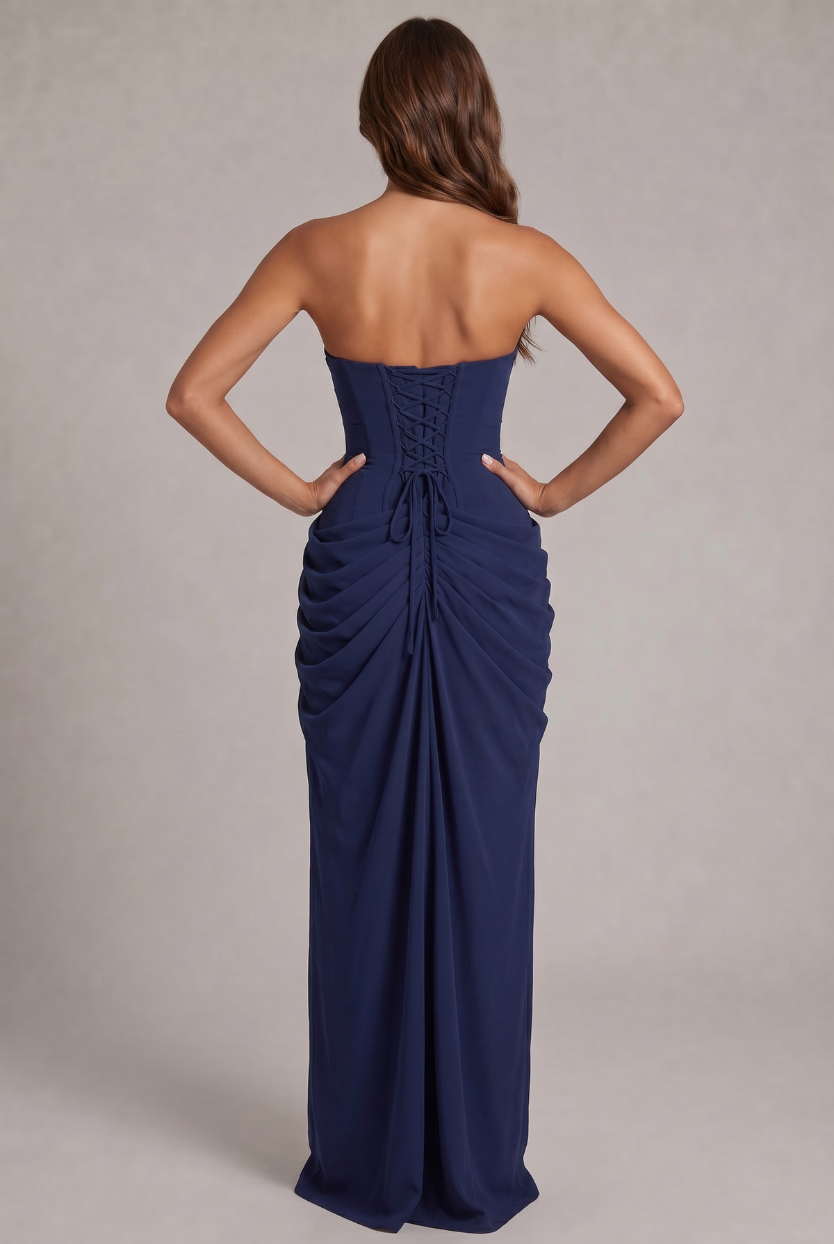Back view of the navy dress with corset lacing and gathered ruched skirt 16