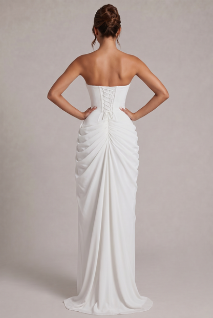 Back view of the white dress with lace-up corset back and ruched skirt with train 20