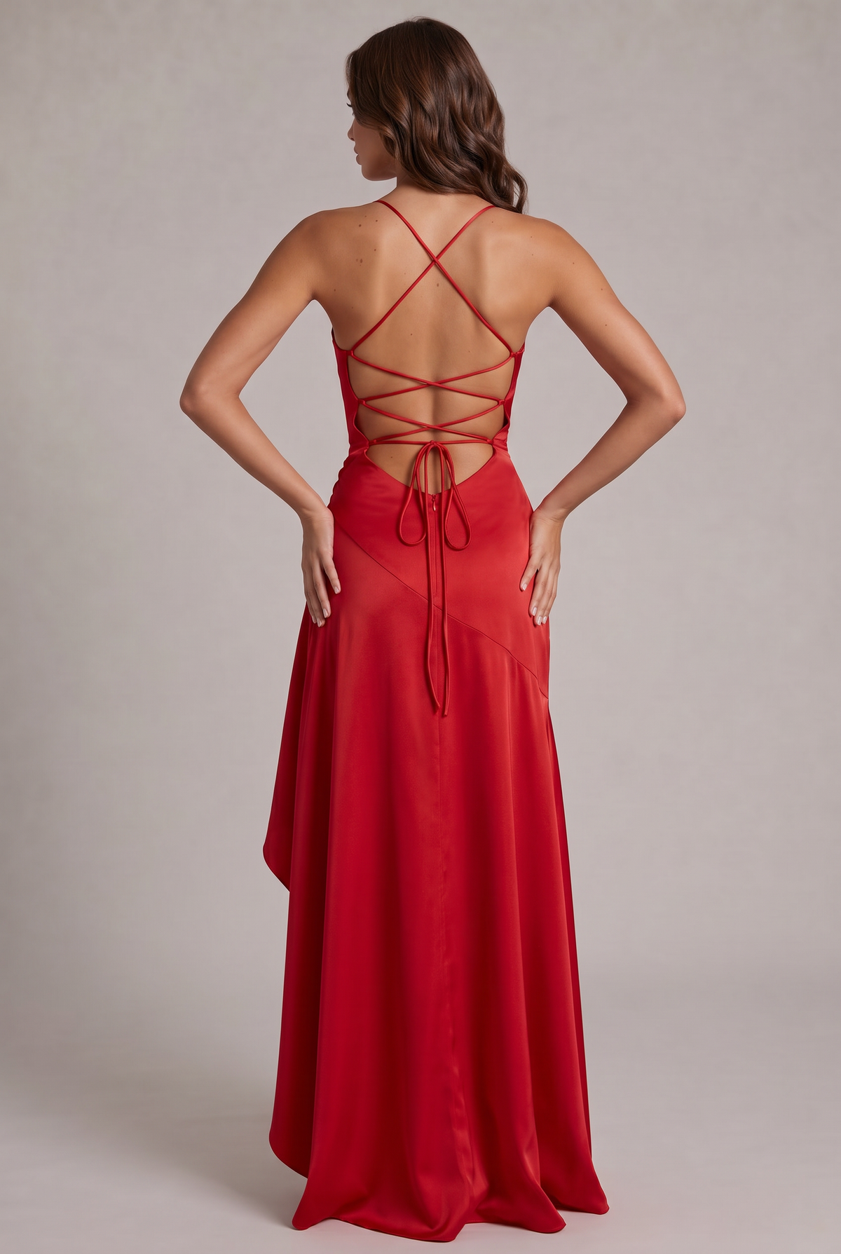 Back view of the red dress showing the criss-cross lace-up open back, bow tie and central zip. 16