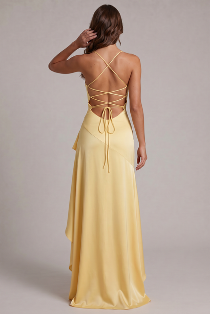 Back view of the pale yellow satin dress, showing the crisscross lace-up open back and long ruffled skirt. 32