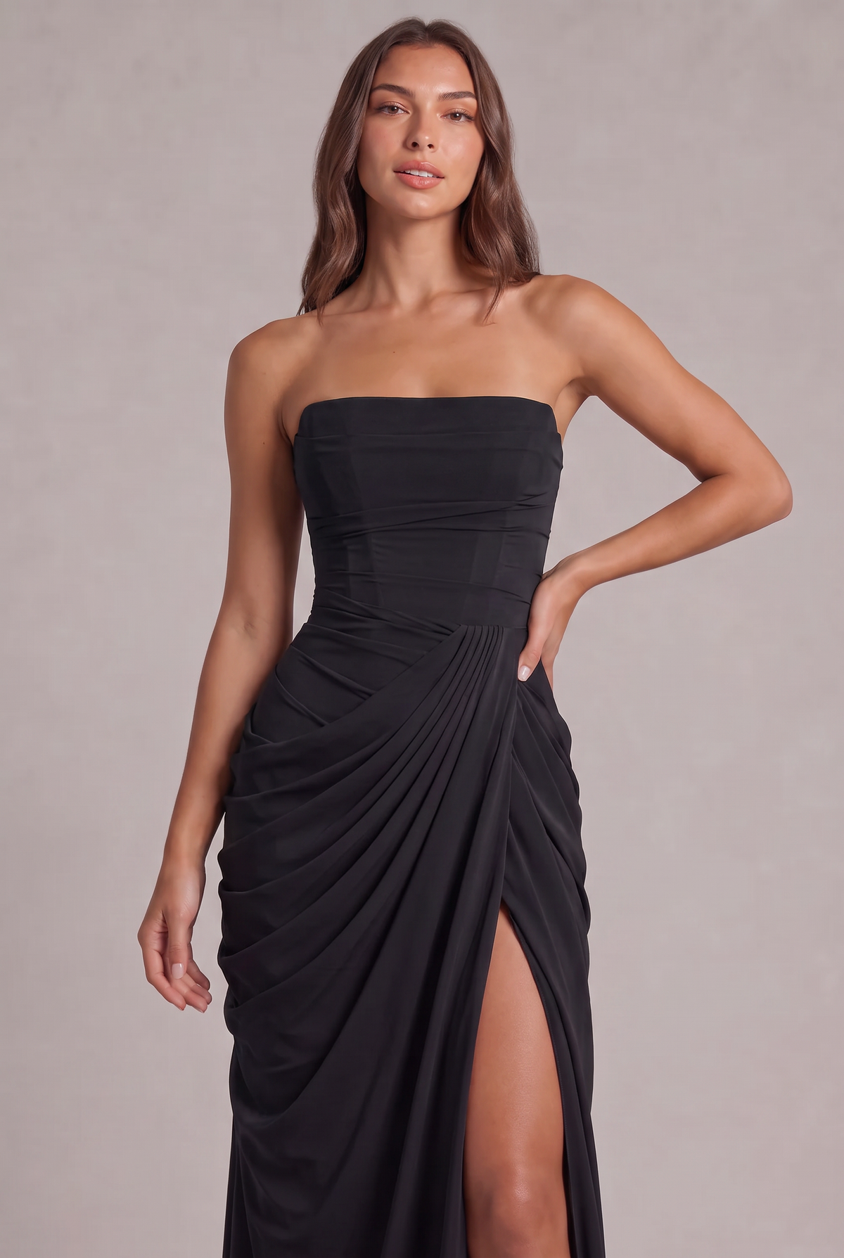 Close-up of the black corset bodice and pleated wrap draping at the waist 26
