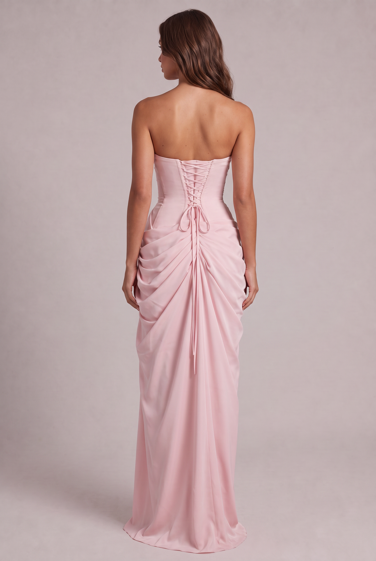 Back of the pale pink dress showing corset lacing and gathered, ruched skirt 8