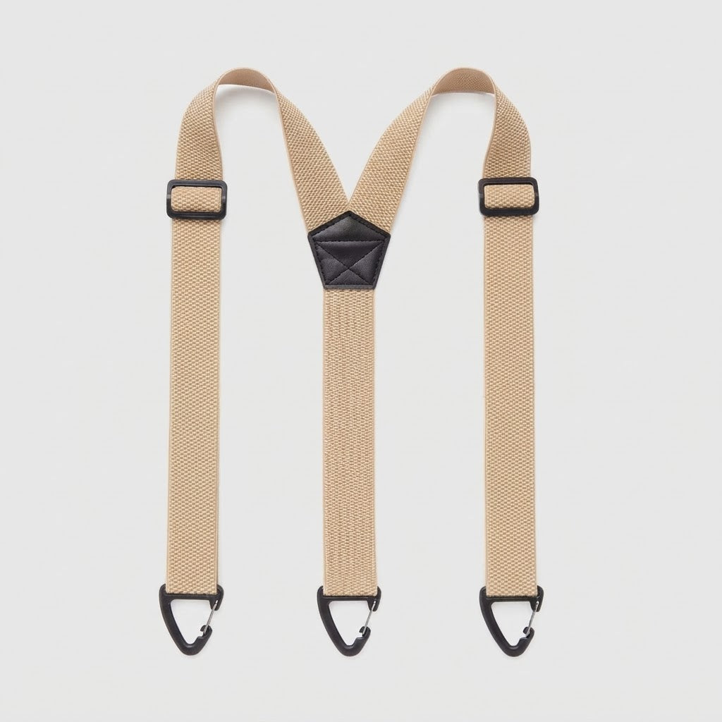 Flat lay of beige Y-shape braces with three black clip hooks and a black centre patch 14