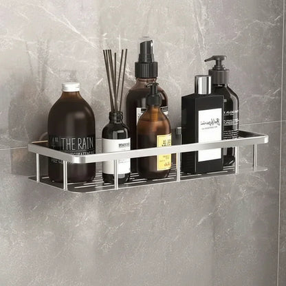 Black slatted shelf with a gripping adhesive plate, holding dark and amber bottles and a reed diffuser 5
