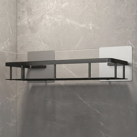 Two stacked black wall shelves holding spice jars and oil bottles, fixed to white tiles 1