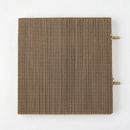 Top-down view of the square corrugated cardboard platform with two threaded metal bolts sticking out from one side. 5
