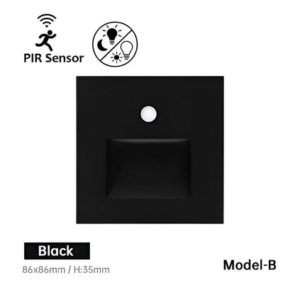 Front of the black square wall light with a round sensor and a recessed light window 12