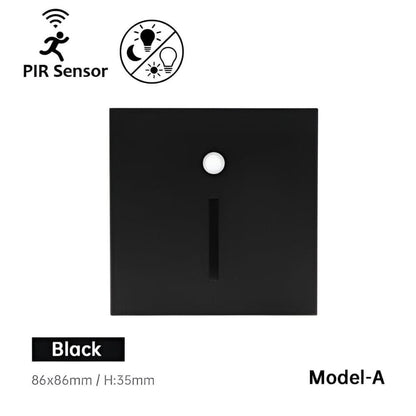 Front of the square black wall light with a round sensor and a narrow vertical light slot 1