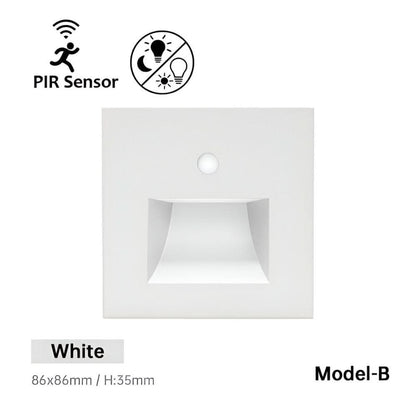 Front of the white square wall light with a round sensor and a recessed light window 10