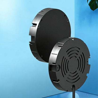Two black round charger units against a blue background, one showing its plain face and the other its slotted vent back with cable. 8