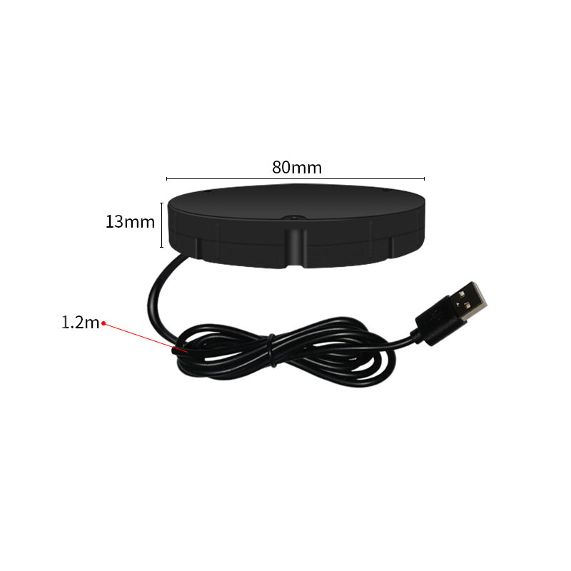 Black round charger with a USB cable coiled beneath it, annotated with its diameter, thickness and cable length. 9