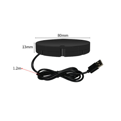 Black round charger with a USB cable coiled beneath it, annotated with its diameter, thickness and cable length. 9