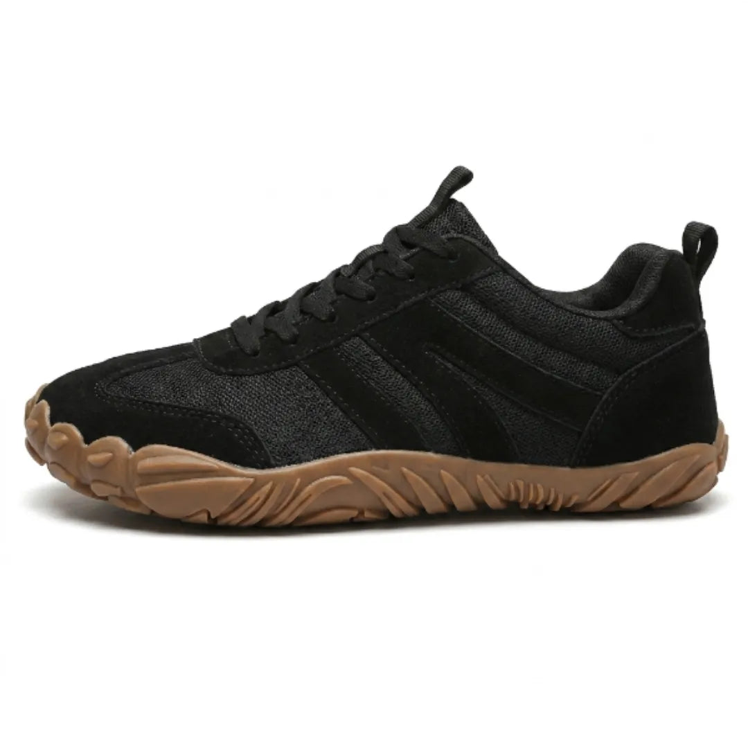 Side view of the all-black mesh and suede barefoot shoe with black laces and a flexible tan rubber sole. 19